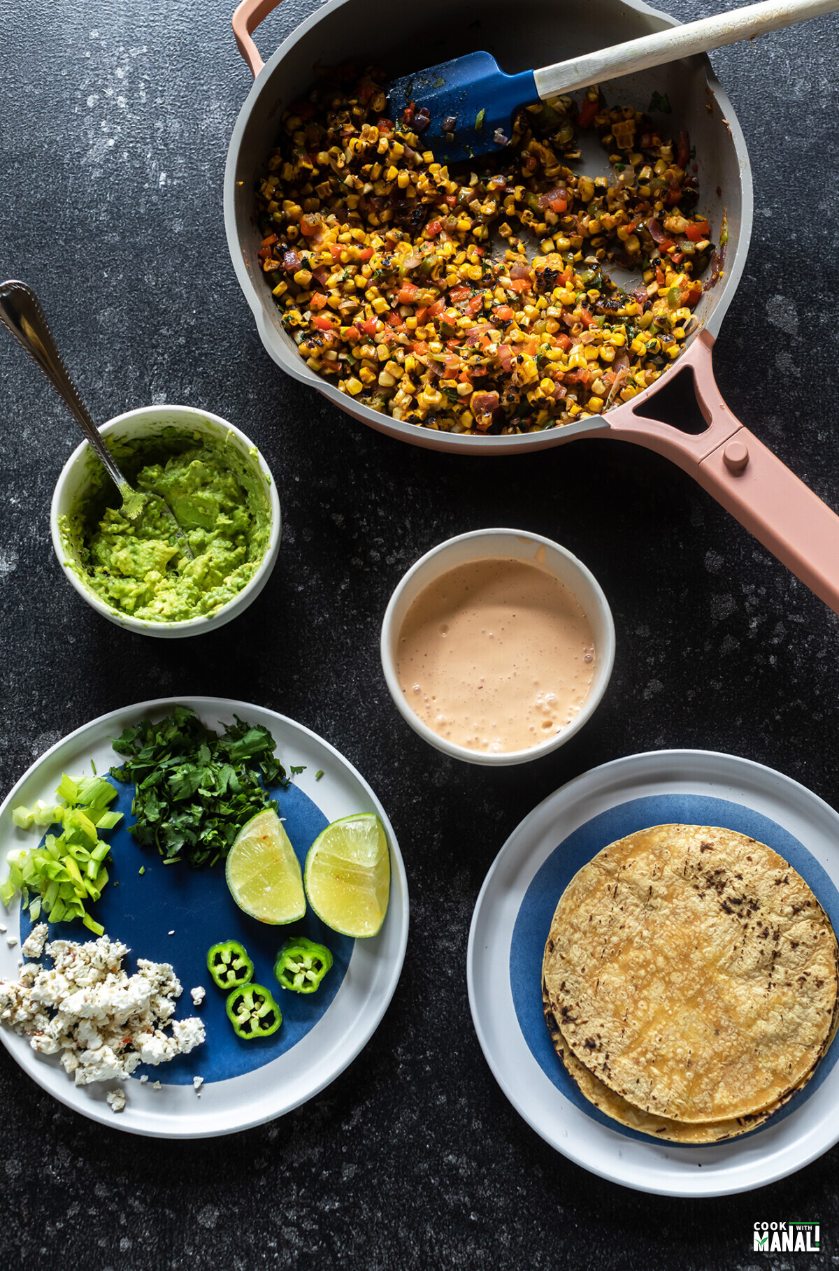components for corn tacos arranged on a board
