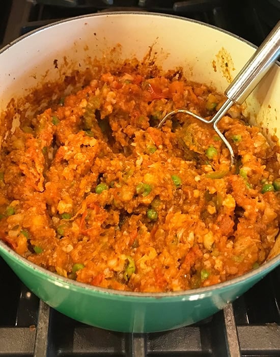 potato mashed mashing the vegetables in bhaji