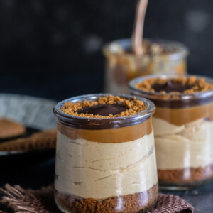 3 biscoff pudding jars arranged in a line, one behind the other