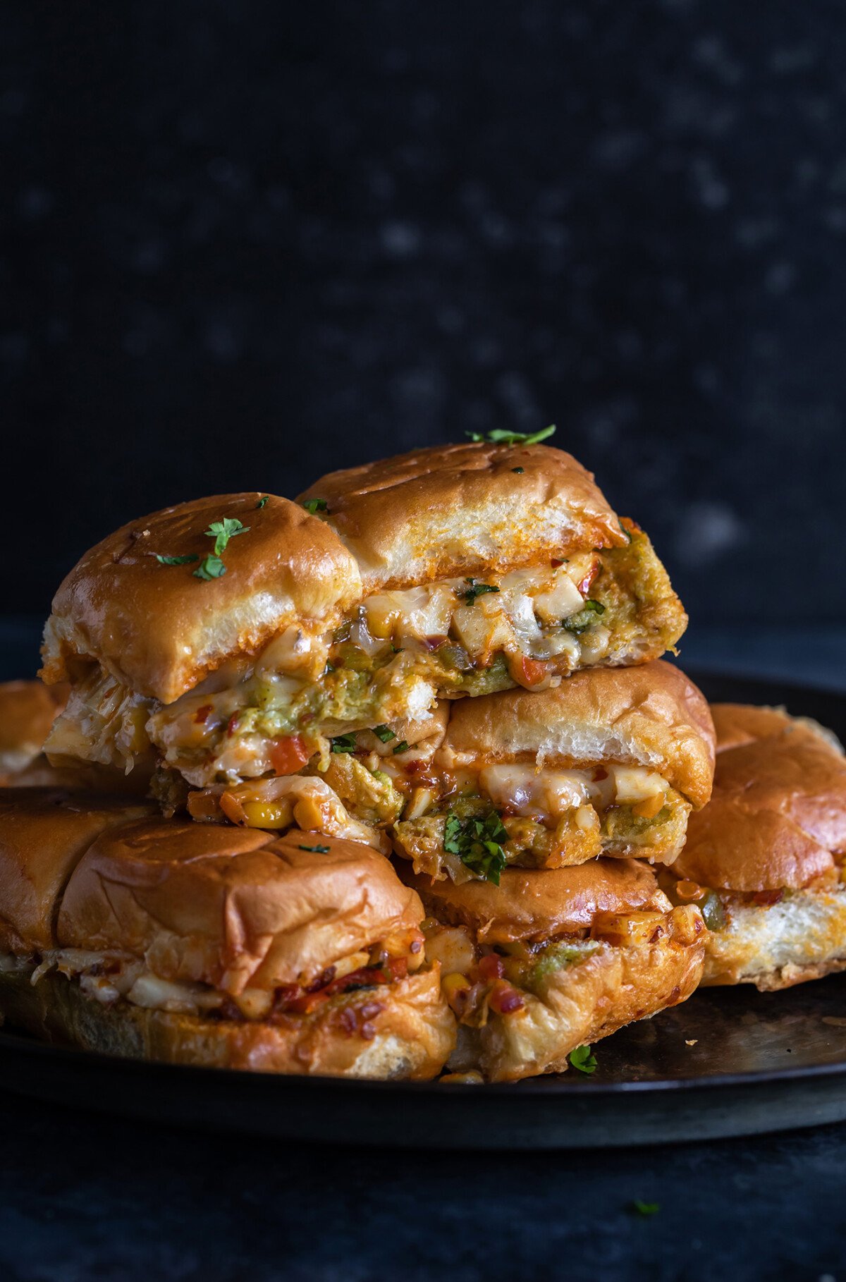 photo of paneer sliders stacked on top of each other