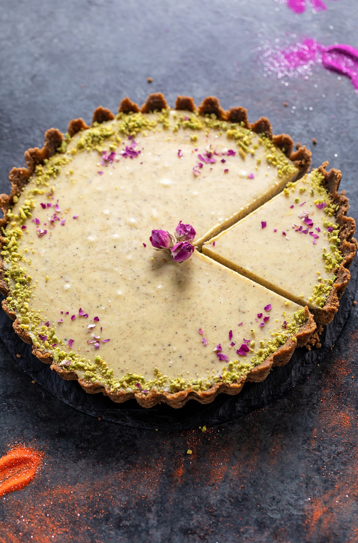 white chocolate thandai tart decorated with dried rose petal