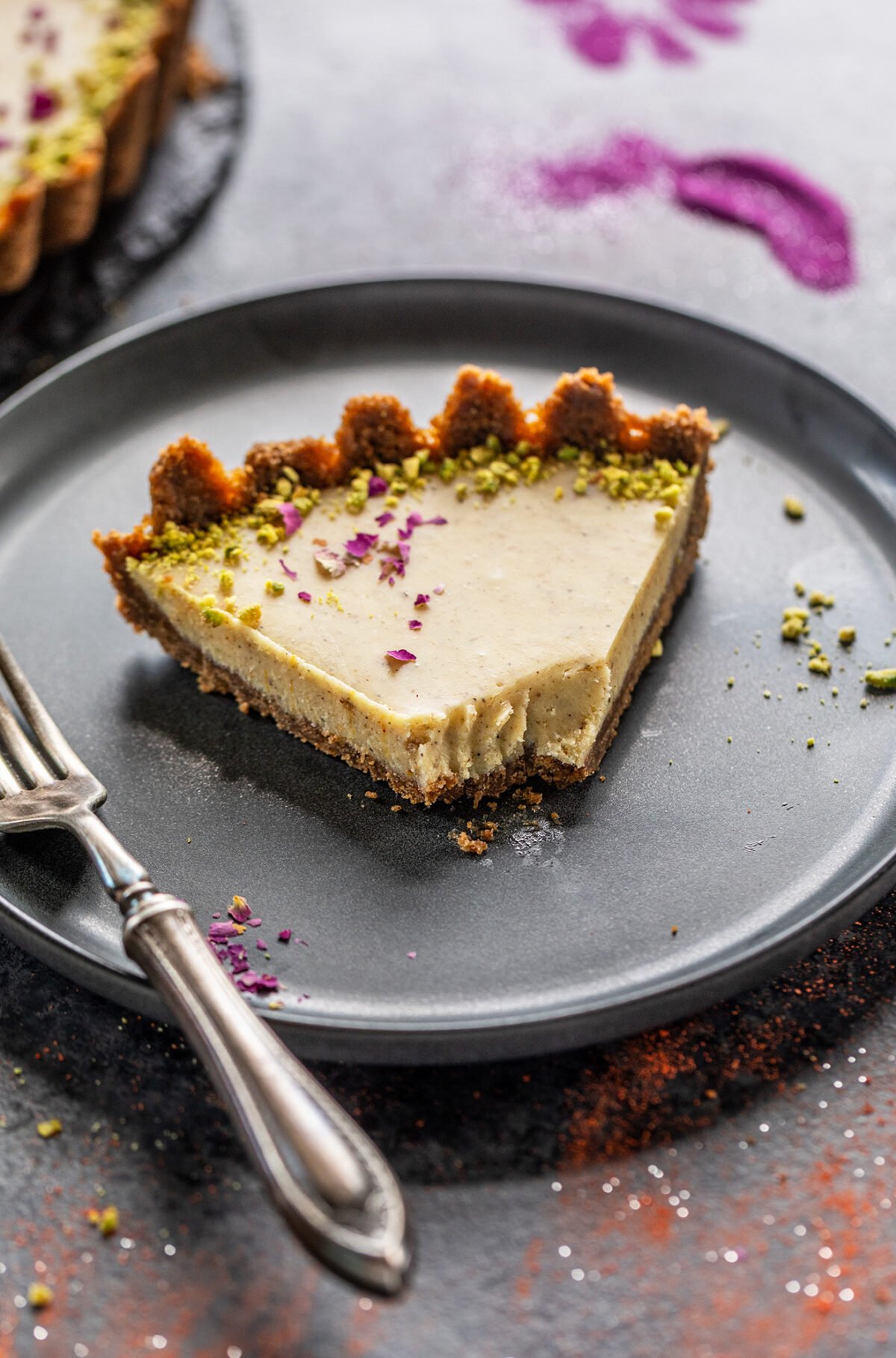 slice of thandai tart served in a plate 