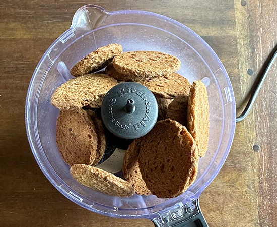 ginger snaps added to a mini food processor