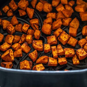 roasted sweet potatoes arranged in air fryer