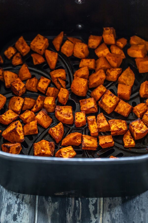 roasted sweet potatoes arranged in air fryer
