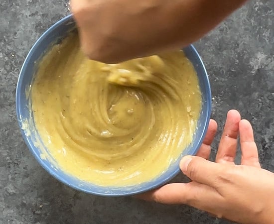 wire whisk whisking the contents in a bowl