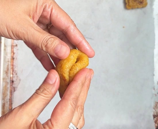 hands pressing the peda to seal it from both sides