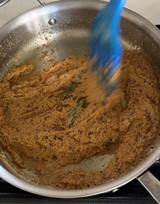 masala being cooked in pan
