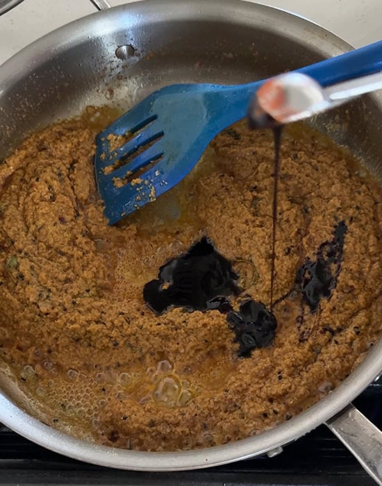 tamarind being added to pan