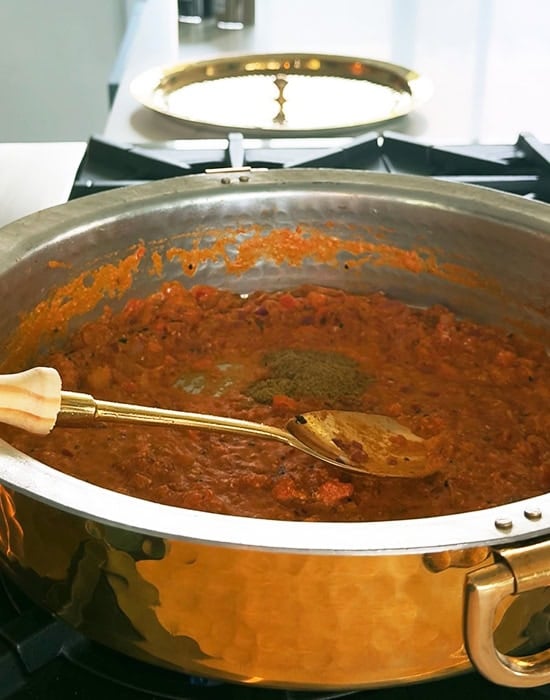 masala being stirred in a pan