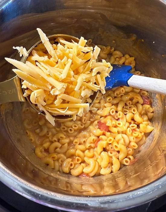 cheese being added to instant pot