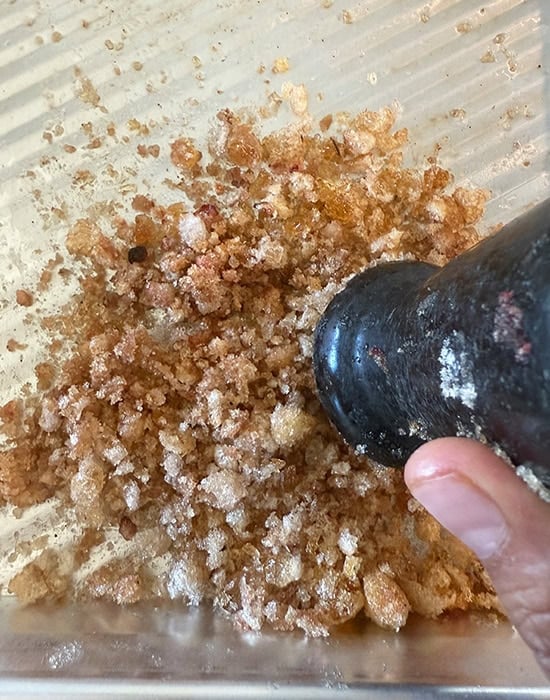 edible gum being crushed with mortar
