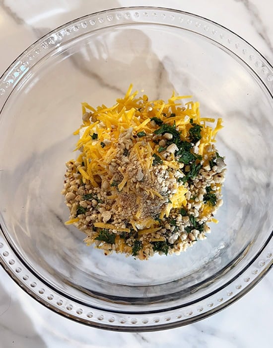 cheese with herbs in a bowl