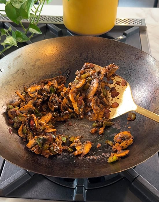 cooked mushrooms in a wok