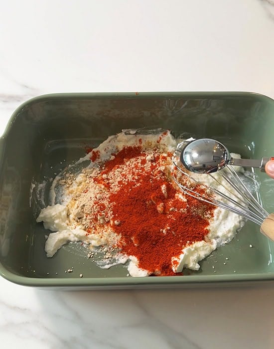 yogurt with spices in a pan