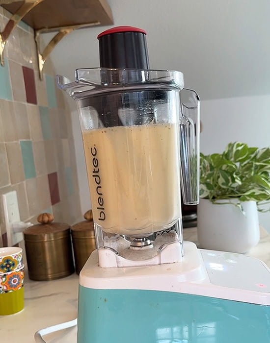 moong dal batter being blended in a blender