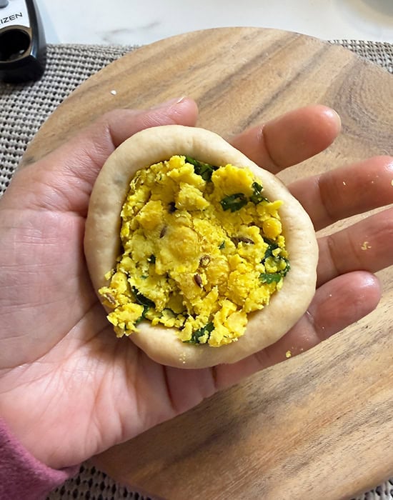 rolled dough ball filled with chana dal filling