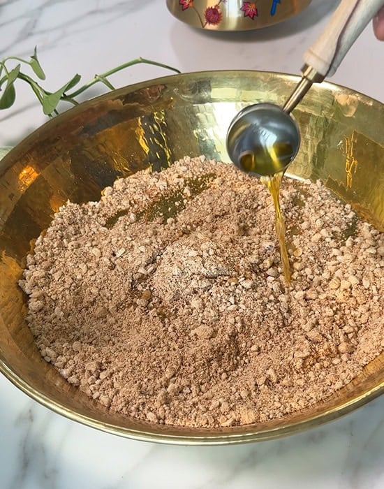 adding ghee to a pan