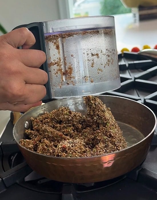 adding blended dough to a pan