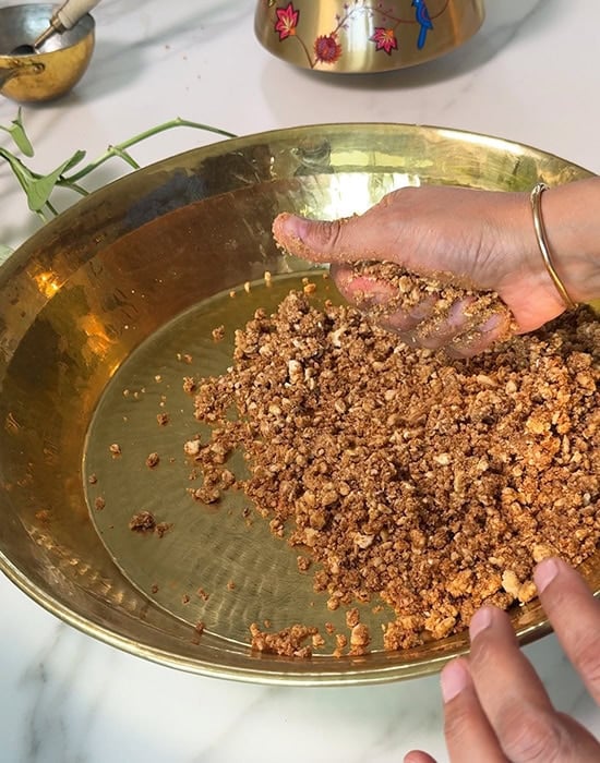 making ladoo using palm
