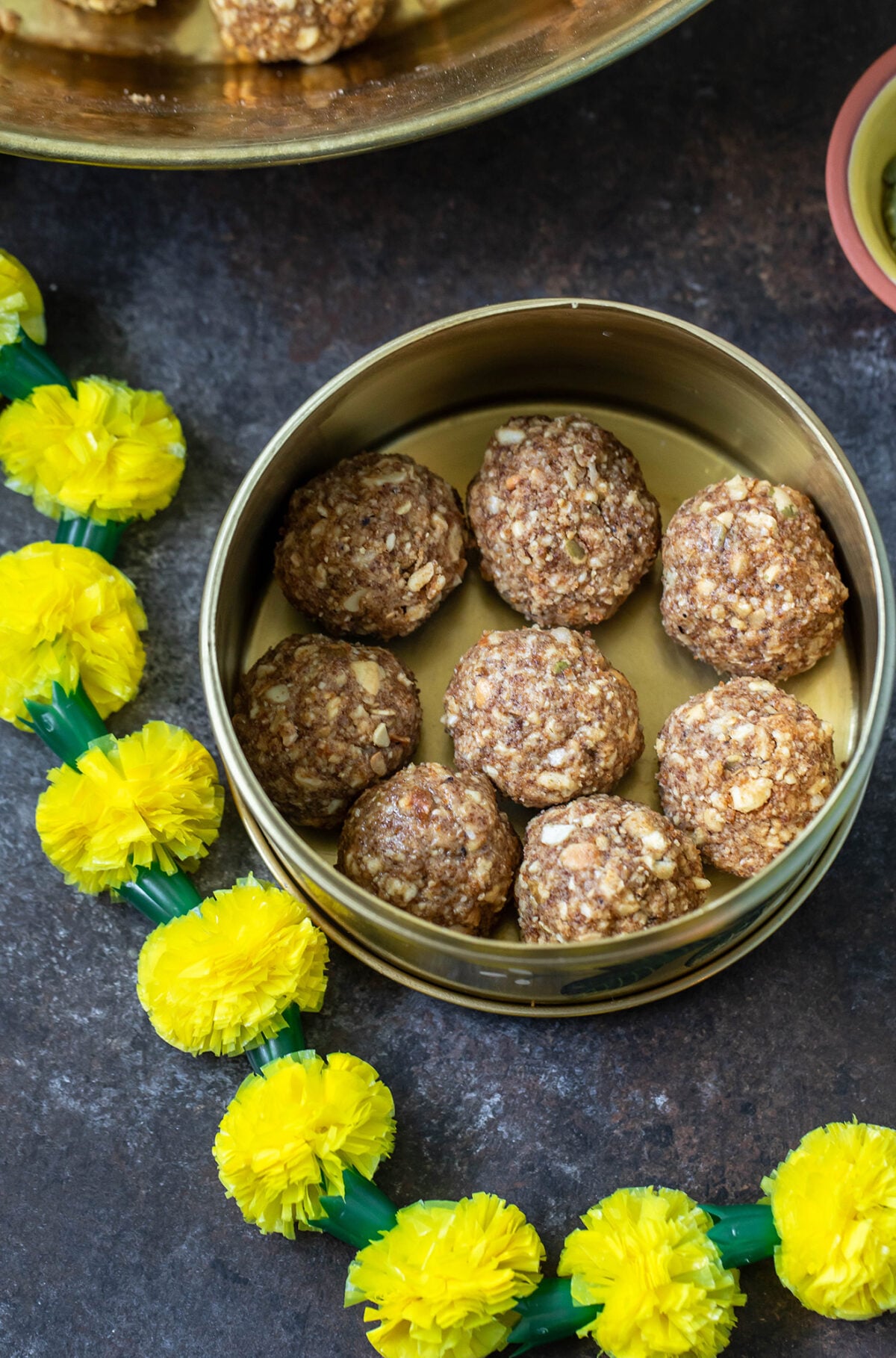 sattu ladoos in a copper tiffin box